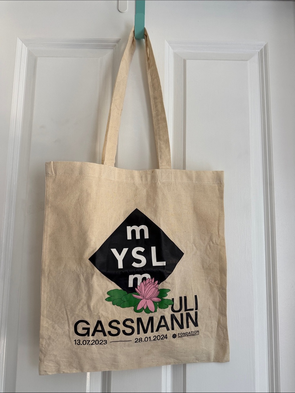 Yves Saint Laurent Beige Canvas Tote with Black Logo and Pink Floral Accent